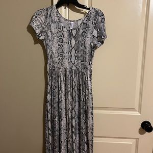 Snakeskin print. Worn once